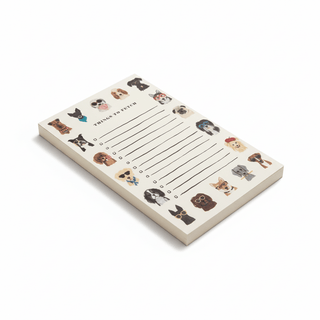 Things to Fetch dog notepad shown at angle with illustrated dog breeds