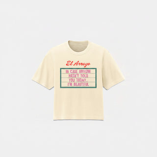 Beige t-shirt with text design on a white background