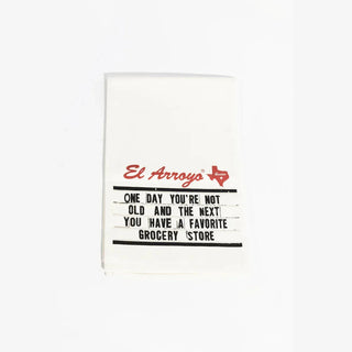 White El Arroyo kitchen towel featuring Texas silhouette and grocery store humor quote