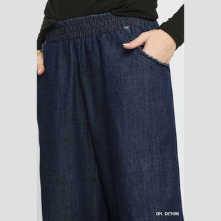Dark indigo washed denim wide-leg pants with elastic waistband and frayed pocket detail