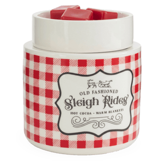 Candle Warmers Sleigh Rides electric wax warmer with red gingham pattern and red wax melts on top