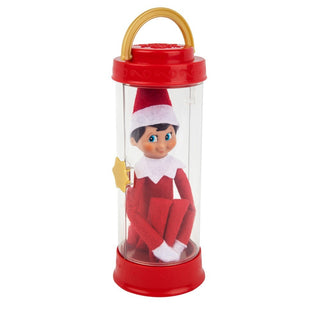 Elf on the Shelf Scout Elf plush doll inside red and clear cylindrical carrier with gold handle
