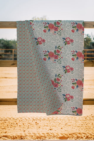 Ida Mae EB Zara Floral Linen Quilt draped over wooden fence showing both sides