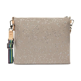 Glittery beige handbag with a colorful strap 