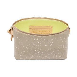 Beige glittery pouch with a yellow interior 