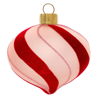 Pink glass onion ornament with red velvet candy stripe swirls and gold cap