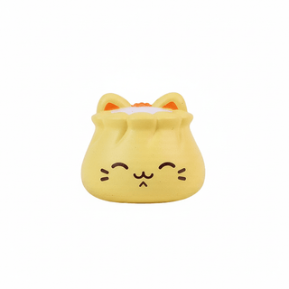 Yellow cat shuomai squishi toy with smiling face