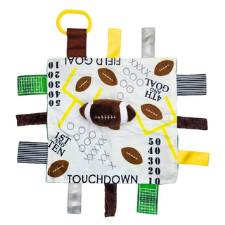 Flat lay of 10x10 inch football lovey with touchdown text and yellow toy link clip