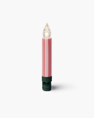 Pink candy stripe clip-on candle light with green base and clear flame bulb