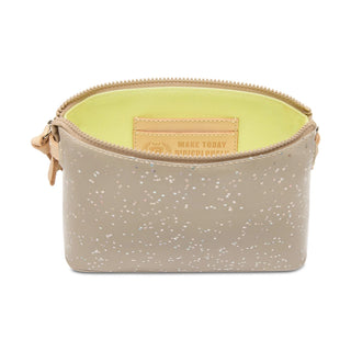 Beige glittery pouch with a yellow interior 