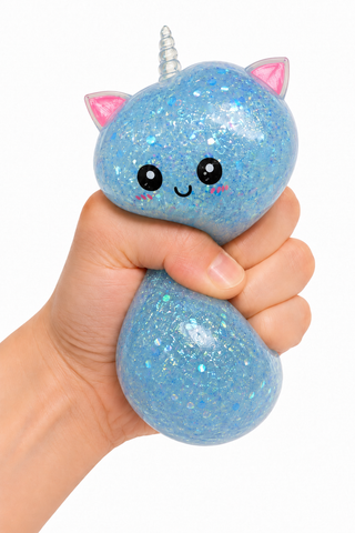 Blue glitter unicorn cat squeeze toy being squished in hand