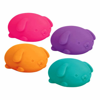 Four Funky Pup Nee Doh squeeze toys in pink, purple, orange, and teal puppy shapes