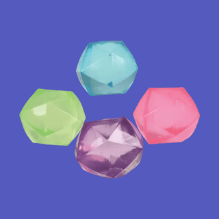 four pack of translucent geometric fidget balls in blue magenta and purple gem shapes