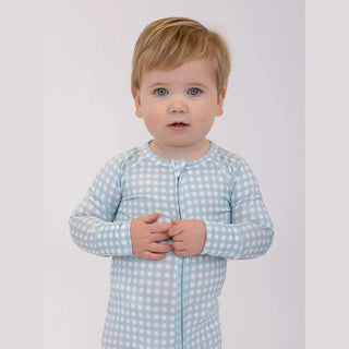 Child wearing the gingham and cottage blue zippie