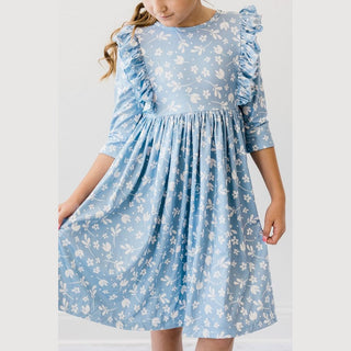 Girl's light blue floral ruffle twirl dress with three-quarter sleeves and full A-line skirt