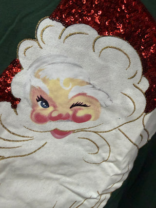 Green long sleeve top with winking vintage Santa face and red sequin hat