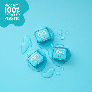 Three teal Glo Pals Blair light-up sensory cubes with cartoon faces surrounded by water droplets