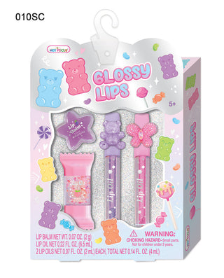 Hot Focus Glossy Lips Sugar Crush set with lip balm, lip oil, and two lip glosses in candy-themed packaging