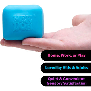 Cyan blue Nee Doh Nice Cube Glow held in palm showing rounded edges and quiet sensory satisfaction