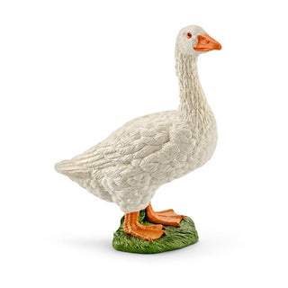 Schleich white goose figurine standing on green grass base with orange beak and feet