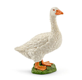 Schleich white goose figurine standing on green grass base with orange beak and feet