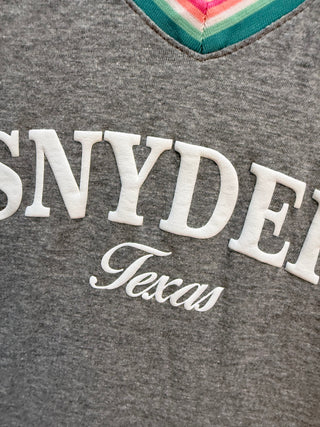 Grey v-neck top with rainbow stripe trim and Snyder Texas lettering