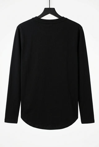 Black long sleeve crew neck top, back view, hung on hanger