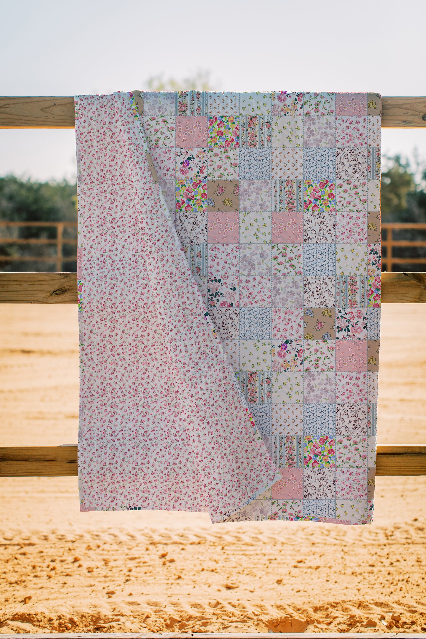 patchwork quilt in pink and blue and green and yellow