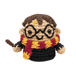Woobles Harry Potter crochet amigurumi figure with glasses, wand, and Gryffindor scarf