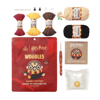 The Woobles Harry Potter Learn to Crochet Kit with yarn, hook, safety eyes, and instruction booklet