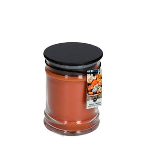 White background studio shot of Harvest Pumpkin jar candle with flat black lid and logo sticker