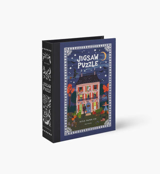 Rifle Paper Co. 500-piece Haunted House Halloween jigsaw puzzle in book-style box packaging