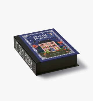 Rifle Paper Co. Haunted House Halloween jigsaw puzzle in book-style black box with navy lid