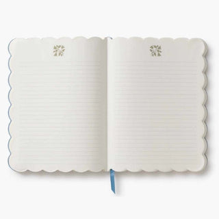 White notebook with scalloped edges 