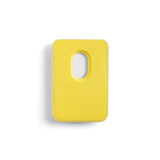 Yellow faux leather magnetic wallet with oval card access cutout and stitched edges