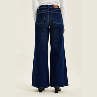 Judy Blue back view high rise wide leg jeans with leather brand tag and pocket detail