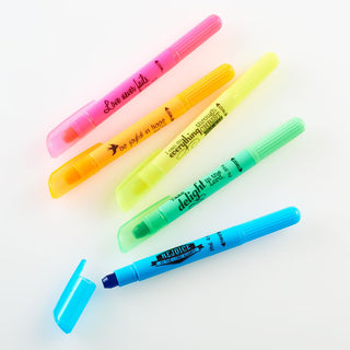 Five colorful highlighters with text