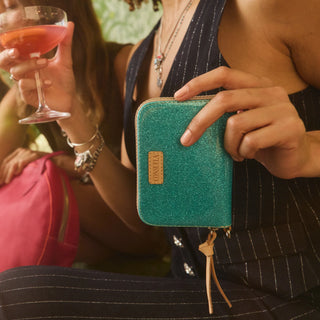 Model holding The Lumi Wallet