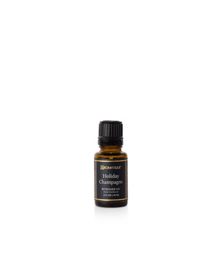 Aromatique Holiday Champagne Refresher Oil in 15ml amber glass bottle with black cap