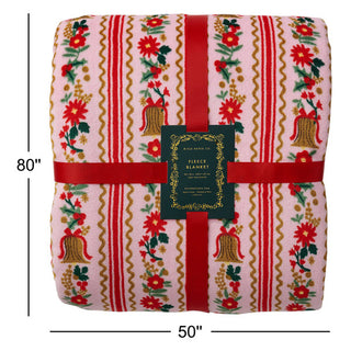 Rifle Paper Co Holly Jolly Fleece Blanket folded and tied with red ribbon, 50x80 inches