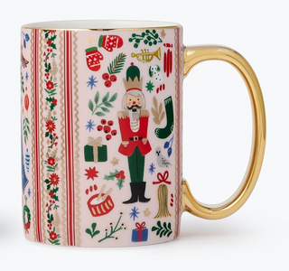 White porcelain mug with festive nutcracker print and shiny gold handle