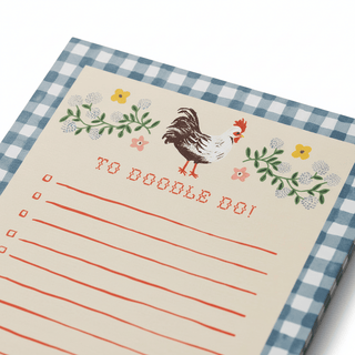 Close-up of To Doodle Do notepad showing rooster and floral details