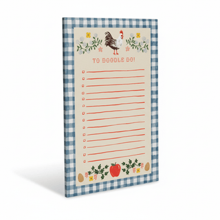 Home Sweet Home Notepad shown at an angle displaying rooster illustration and gingham border
