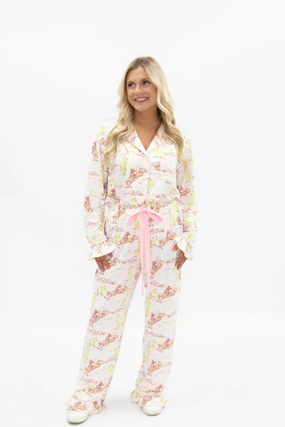 White pink long sleeve button-up pajama set with western cowgirl horse cactus print