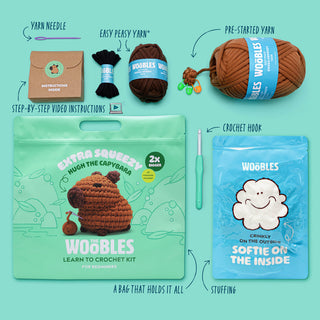 Woobles Hugh the Capybara Extra Squeezy crochet kit with yarn, hook, stuffing, and instructions