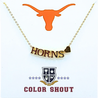 Gold necklace with 'Horns' pendant on a white package with Texas Longhorn logo.