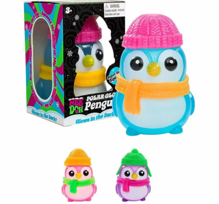 Nee Doh glow-in-the-dark squishy penguin toy in blue, pink hat, orange scarf
