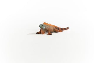 Schleich iguana figurine in orange and teal coloring on white background