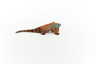 Schleich iguana figurine with orange body, teal head, and dorsal spines on white background