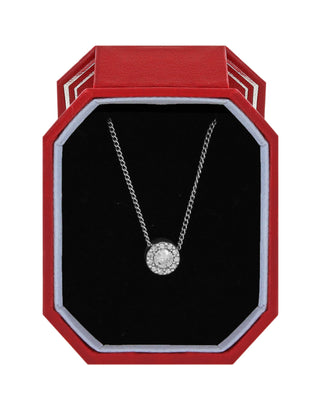 Brighton Illumina Solitaire necklace with crystal halo pendant displayed in red octagonal gift box